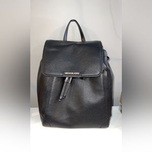Black Michael Kors back pack purse. Great condition
